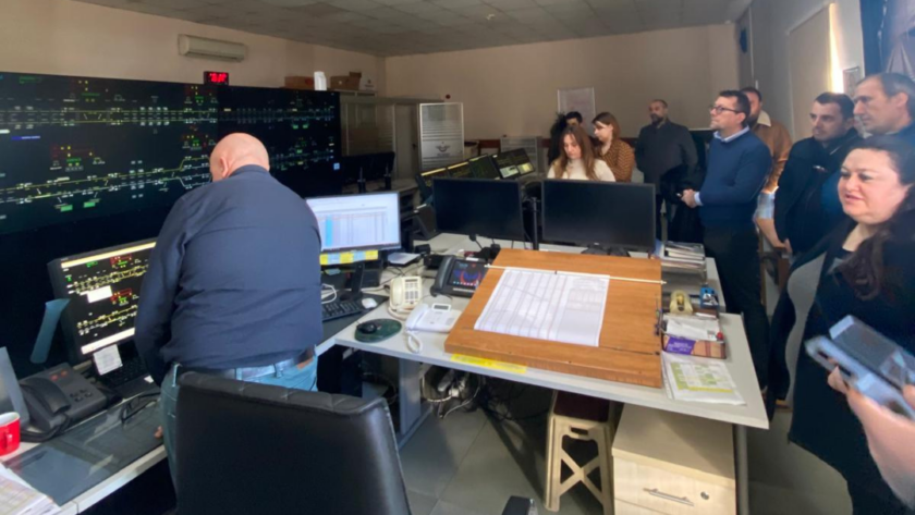 RISS professionals observing operations inside a railway control room